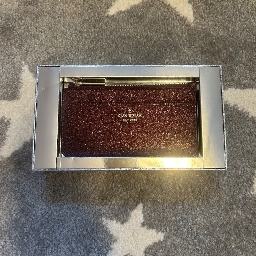 Kate Spade large slim cardholder in deep nova